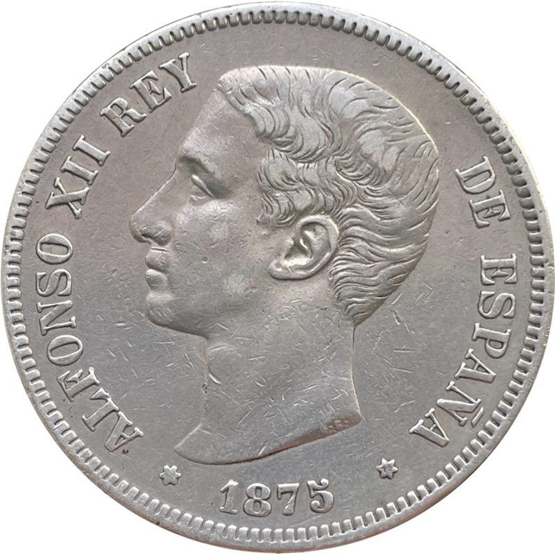 Anverso del 5 pesetas de 1875: cabeza de Alfonso XII a la izquierda, leyenda ALFONSO XII REY DE ESPAÑA y fecha 1875 entre dos estrellas