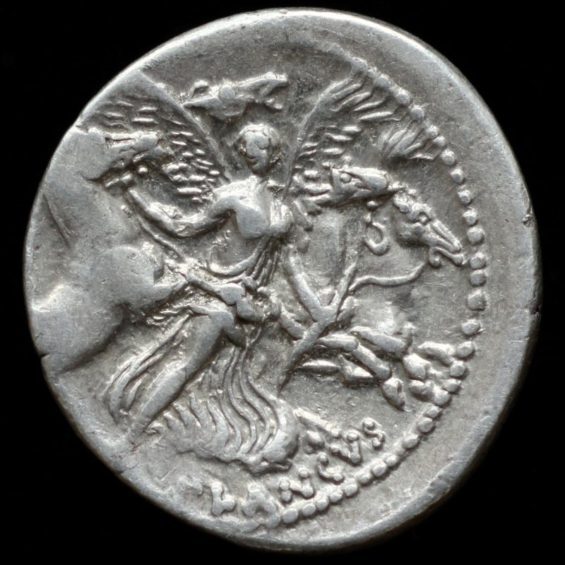 Reverso de un denario de Plaucio Planco con la cabeza de Medusa