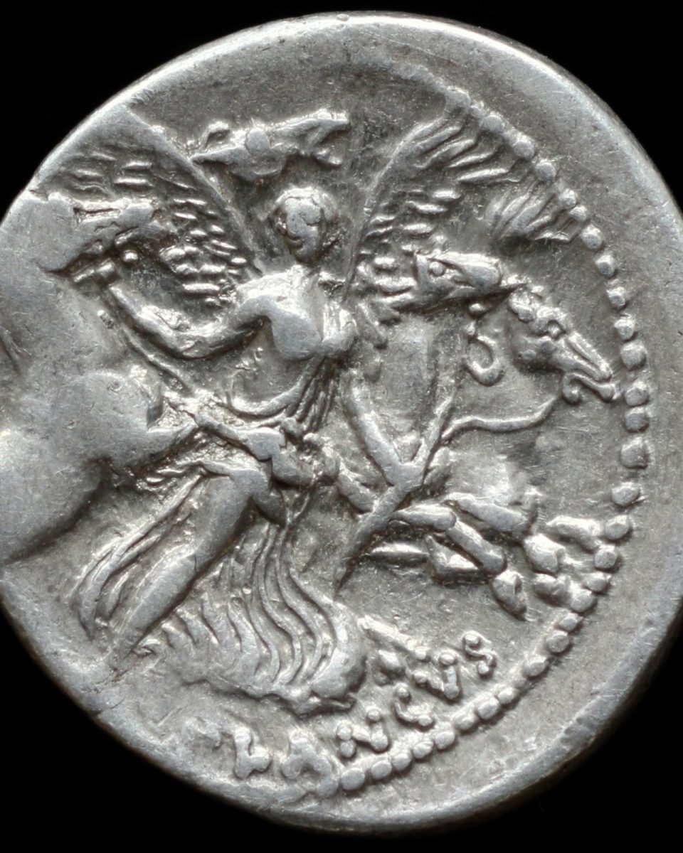 Reverso de un denario de Plaucio Planco con la cabeza de Medusa